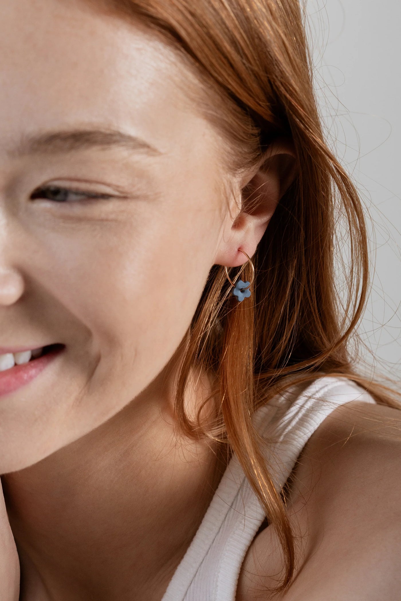 Blue daisy hoop earrings