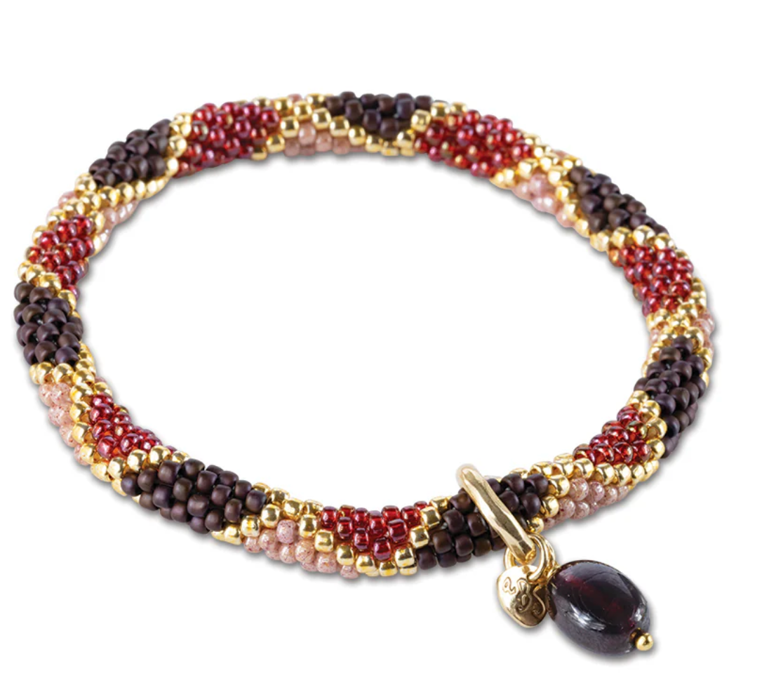 A beautiful story garnet and gold bracelet